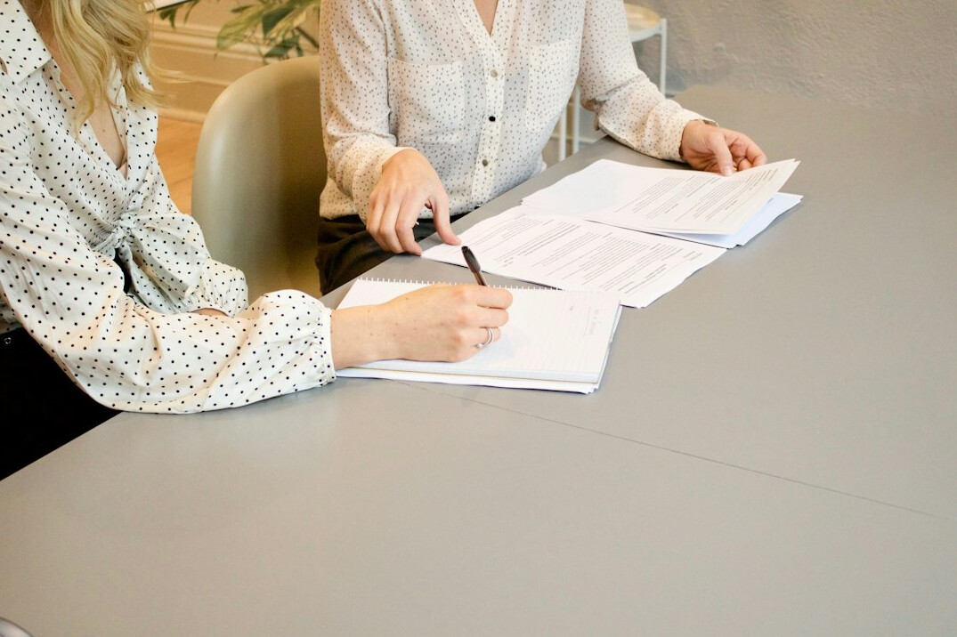 insurance agent with client